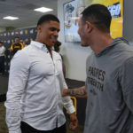 
              San Diego Padres outfielder Juan Soto, left, greets third baseman Manny Machado during a news conference at Petco Park Wednesday, Aug. 3, 2022, in San Diego. Soto, the generational superstar whose trade-deadline acquisition instantly made the Padres a strong playoff contender, was introduced at a news conference Wednesday along with fellow newcomer Josh Bell. (AP Photo/Gregory Bull)
            