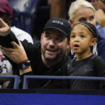 
              Serena Williams' husband Alexis Ohanian and daughter Alexis Olympia Ohanian Jr., watch her play against Danka Kovinic, of Montenegro, during the first round of the US Open tennis championships, Monday, Aug. 29, 2022, in New York. (AP Photo/John Minchillo)
            
