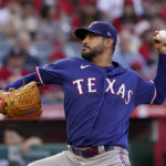 
              Texas Rangers starting pitcher Martin Perez throws to the plate during the first inning of a baseball game against the Los Angeles Angels Friday, July 29, 2022, in Anaheim, Calif. (AP Photo/Mark J. Terrill)
            
