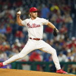 
              Philadelphia Phillies' Noah Syndergaard pitches during the first inning of a baseball game against the Cincinnati Reds, Monday, Aug. 22, 2022, in Philadelphia. (AP Photo/Matt Slocum)
            