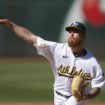 
              Oakland Athletics starting pitcher Adam Oller delivers against the San Francisco Giants during the second inning of a baseball game, Saturday, Aug. 6, 2022, in Oakland, Calif. (AP Photo/D. Ross Cameron)
            