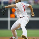 
              Philadelphia Phillies starting pitcher Aaron Nola delivers during the first inning of a baseball game against the New York Mets, Friday, Aug. 19, 2022, in Philadelphia. (AP Photo/Chris Szagola)
            