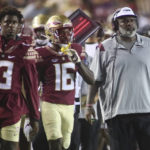 
              Florida State associate head coach/defensive tackles coach Odell Haggins, right, looks on in the fourth quarter of an NCAA college football game against Duquesne, Saturday, Aug. 27, 2022, in Tallahassee, Fla. (AP Photo/Phil Sears)
            
