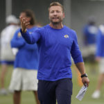 
              Los Angeles Rams head coach Sean McVay participates in drills at the NFL football team's practice facility in Irvine, Calif. Sunday, July 31, 2022. (AP Photo/Ashley Landis)
            