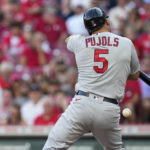 
              St. Louis Cardinals' Albert Pujols is hit by a pitch during the second inning of the team's baseball game against the Cincinnati Reds on Tuesday, Aug. 30, 2022, in Cincinnati. (AP Photo/Jeff Dean)
            