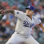 
              Los Angeles Dodgers' Julio Urias pitches against the San Francisco Giants during the first inning of a baseball game in San Francisco, Wednesday, Aug. 3, 2022. (AP Photo/Jeff Chiu)
            