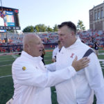 
              Wyoming head coach Craig Bohl, left, and Illinois head coach Brent Bielema talk after Illinois defeated Wyoming in an NCAA college football game Saturday, Aug. 27, 2022, in Champaign, Ill. (AP Photo/Charles Rex Arbogast)
            