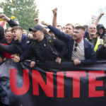 
              Fans gather to protest against the Manchester United owners outside the Old Trafford ground, Manchester, England, Monday Aug. 22, 2022, before the English Premier League match between Manchester United and Liverpool. (Peter Byrne/PA via AP)
            