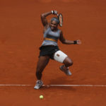 
              FILE - Serena Williams from US returns the ball to Shuai Peng from China during a Madrid Open tennis tournament match in Madrid, Spain, Wednesday, May 7, 2014. After nearly three decades in the public eye, few can match Serena Williams' array of accomplishments, medals and awards. Through it all, the 23-time Grand Slam title winner hasn't let the public forget that she's a Black American woman who embraces her responsibility as a beacon for her people. (AP Photo/Andres Kudacki, File)
            