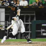 
              Chicago White Sox's Andrew Vaughn hits an RBI single against the Detroit Tigers during the seventh inning of a baseball game Saturday, Aug. 13, 2022, in Chicago. (AP Photo/Matt Marton)
            