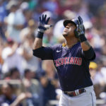 
              Cleveland Guardians' Jose Ramirez reacts after hitting a home run during the fourth inning of a baseball game against the San Diego Padres, Wednesday, Aug. 24, 2022, in San Diego. (AP Photo/Gregory Bull)
            