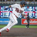 
              Minnesota Twins' Luis Arraez rounds third base en route to scoring against the Toronto Blue Jays on a single by Jorge Polanco during the third inning of a baseball game Saturday, Aug. 6, 2022, in Minneapolis. (AP Photo/Bruce Kluckhohn)
            