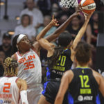 
              Connecticut Sun forward Jonquel Jones (35) blocks a shot-attempt by Dallas Wings forward Isabelle Harrison (20) during Game 2 of a WNBA basketball first-round playoff series Sunday, Aug. 21, 2022, in Uncasville, Conn. (Sean D. Elliot/The Day via AP)
            