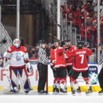 
              Canada celebrates a goal against Czechia goalie Pavel Cajan (1) during the third period of a semifinal in the IIHF world junior hockey championships Friday, Aug. 19, 2022, in Edmonton, Alberta. (Jason Franson/The Canadian Press via AP)
            