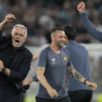 
              FILE - Roma's Jose Mourinho, left, celebrates with his team their victory during the Europa Conference League final between AS Roma and Feyenoord at National Arena in Tirana, Albania, on May 25, 2022. (AP Photo/Antonio Calanni, File)
            