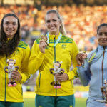
              Silver medalist Mackenzie Little of Australia, gold medalist Kelsey-Lee Barber of Australia and bronze medalist Annu Rani of India, from left to right, pose with their medals on the podium of the Women's javelin throw during the athletics competition in the Alexander Stadium at the Commonwealth Games in Birmingham, England, Sunday, Aug. 7, 2022. (AP Photo/Alastair Grant)
            