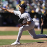
              New York Yankees' Greg Weissert pitches against the Oakland Athletics during the sixth inning of a baseball game in Oakland, Calif., Sunday, Aug. 28, 2022. (AP Photo/Jeff Chiu)
            