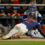 
              Toronto Blue Jays catcher Danny Jansen drops the ball, allowing Minnesota Twins' Nick Gordon to score the winning run during the 10th inning of a baseball game Friday, Aug. 5, 2022, in Minneapolis. The Twins won 6-5. (AP Photo/Bruce Kluckhohn)
            