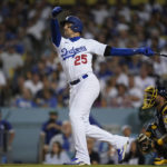 
              Los Angeles Dodgers designated hitter Trayce Thompson (25) hits a home run during the second inning of a baseball game against the Milwaukee Brewers in Los Angeles, Tuesday, Aug. 23, 2022. Joey Gallo and Cody Bellinger also scored. (AP Photo/Ashley Landis)
            