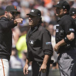 
              San Francisco Giants manager Gabe Kapler, left, makes a point to umpire Phil Cuzzi, second from left, after being ejected during the sixth inning of the team's baseball game against the Los Angeles Dodgers in San Francisco, Thursday, Aug. 4, 2022. (AP Photo/Jeff Chiu)
            
