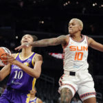 
              Los Angeles Sparks forward Olivia Nelson-Ododa, left, shoots as Connecticut Sun guard Courtney Williams defends during the first half of a WNBA basketball game Thursday, Aug. 11, 2022, in Los Angeles. (AP Photo/Mark J. Terrill)
            