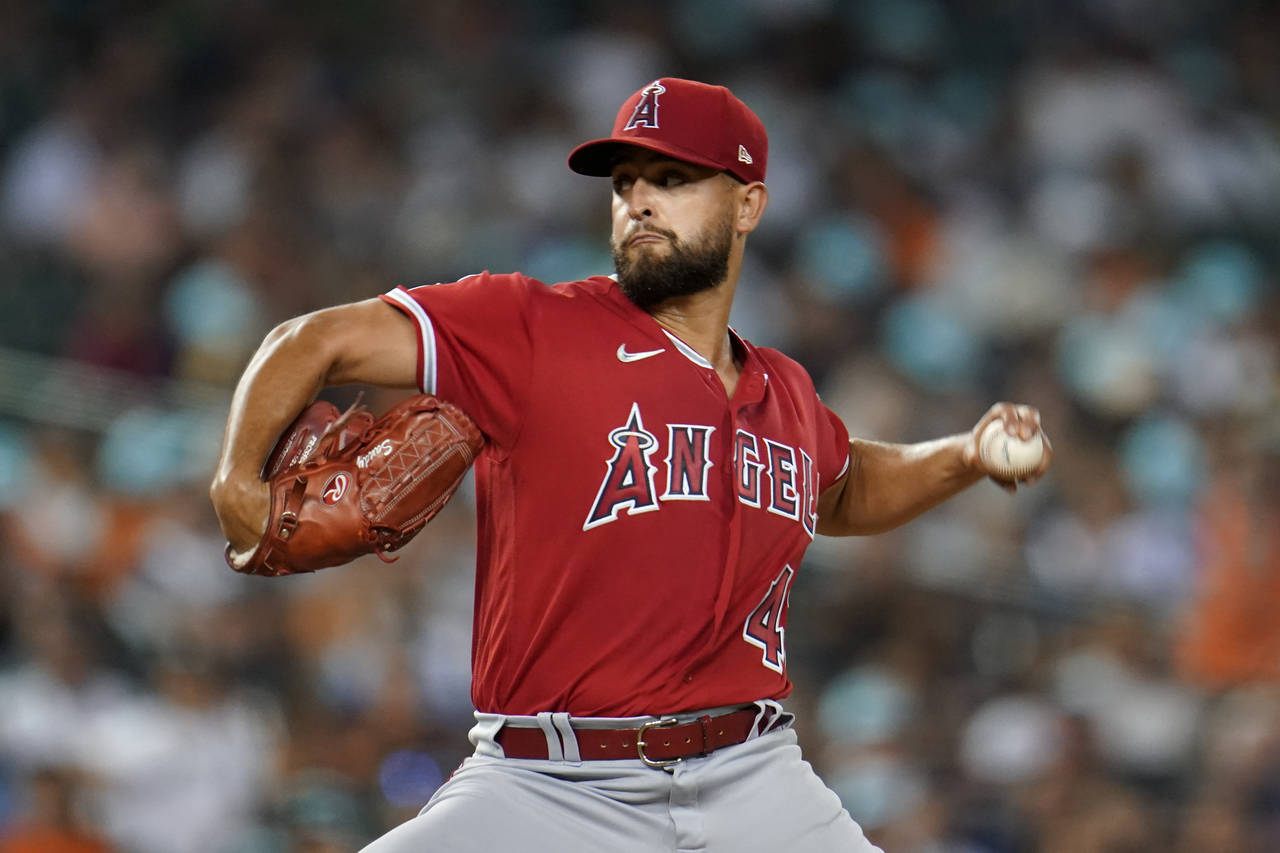 Los Angeles Angels pitcher Patrick Sandoval throws against the Detroit Tigers in the seventh inning...
