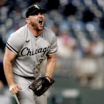 
              Chicago White Sox relief pitcher Liam Hendriks celebrates after the second game of a baseball doubleheader against the Kansas City Royals Tuesday, Aug. 9, 2022, in Kansas City, Mo. The White Sox won 3-2. (AP Photo/Charlie Riedel)
            