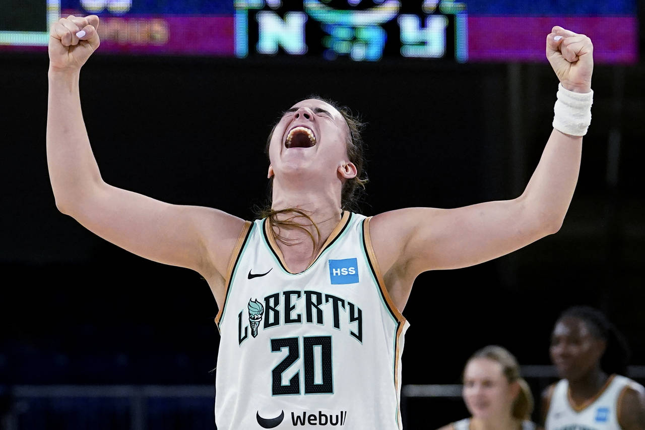New York Liberty guard Sabrina Ionescu reacts after the Liberty defeated the Chicago Sky 98-91 in G...