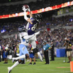 
              Baltimore Ravens wide receiver Shemar Bridges, right, catches a touchdown pass as Tennessee Titans cornerback Chris Jackson defends during the first half of a preseason NFL football game, Thursday, Aug. 11, 2022, in Baltimore. (AP Photo/Nick Wass)
            