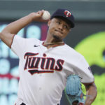 
              Minnesota Twins pitcher Chris Archer throws against the Texas Rangers in the first inning of a baseball game, Saturday, Aug. 20, 2022, in Minneapolis. (AP Photo/Jim Mone)
            