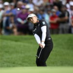 
              Canada's Brooke Henderson hits the ball on the 18th hole during the first round of the CP Women's Open golf tournament, Thursday, Aug. 25, 2022, in Ottawa, Ontario. (Justin Tang/The Canadian Press via AP)
            