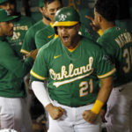 
              Oakland Athletics' Stephen Vogt (21) reacts after hitting a two-run home run in the 10th inning of a baseball game against the New York Yankees in Oakland, Calif., Saturday, Aug. 27, 2022. (Santiago Mejia/San Francisco Chronicle via AP)
            