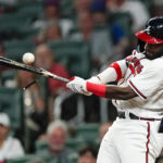 
              Atlanta Braves' Michael Harris II (23) breaks his bat as he grounds out in the fourth inning of the team's baseball game against the New York Mets on Monday, Aug. 15, 2022, in Atlanta. (AP Photo/John Bazemore)
            