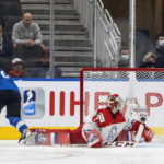 
              Finland's Kasper Simontaival (29) scores on Czechia goalie Jan Bednar (2) for a shootout win during IIHF World Junior Hockey Championship action in Edmonton, Alberta, Thursday, Aug. 11, 2022. (Jason Franson/The Canadian Press via AP)
            