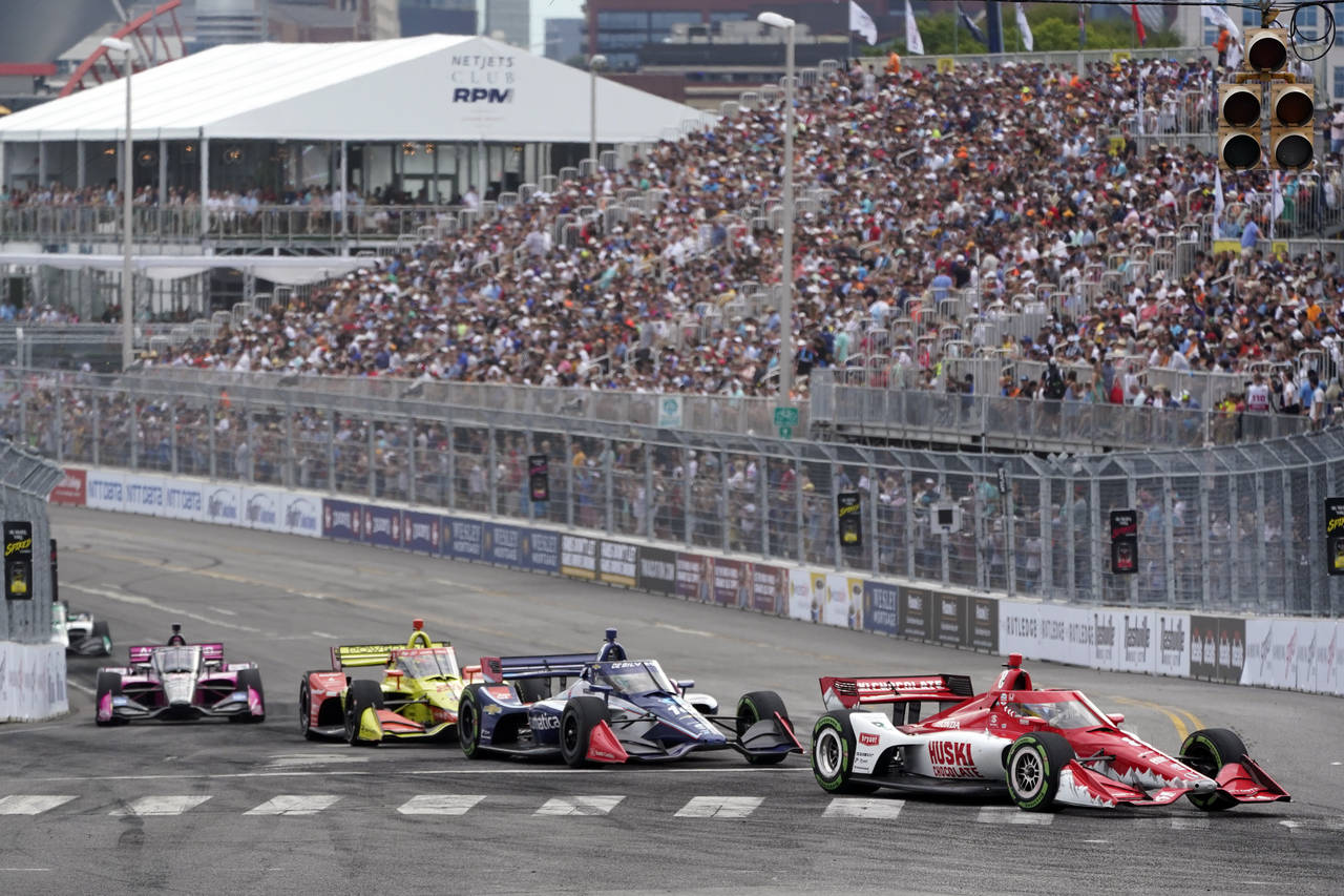 Marcus Ericsson (8) leads others through a turn during the Music City Grand Prix auto race Sunday, ...