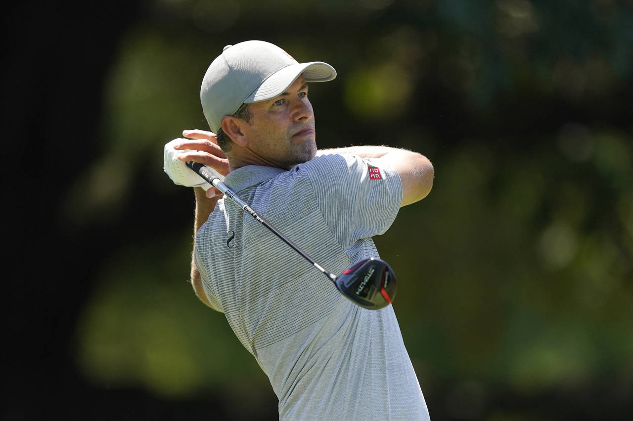 Adam Scott, of Australia, hits off the sixth tee during the third round of the St. Jude Championshi...