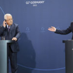 
              German Chancellor Olaf Scholz, right,  and Mahmoud Abbas, President of the Palestinian Authority, answer questions from journalists at a press conference after their talks in Berlin, Germany, Tuesday, Aug.16, 2022. (Wolfgang Kumm/dpa via AP)
            