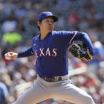 
              Texas Rangers starting pitcher Kohei Arihara (35) throws during the first inning of a baseball game against the Minnesota Twins, Sunday, Aug. 21, 2022, in Minneapolis. (AP Photo/Stacy Bengs)
            