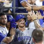 
              Kansas City Royals' Bobby Witt Jr. hits celebrates with teammates after hitting a solo home run off Chicago White Sox starting pitcher Lance Lynn during the fourth inning of a baseball game Wednesday, Aug. 31, 2022, in Chicago. (AP Photo/Kamil Krzaczynski)
            