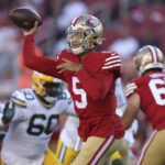 
              San Francisco 49ers quarterback Trey Lance (5) passes against the Green Bay Packers during the first half of an NFL preseason football game in Santa Clara, Calif., Friday, Aug. 12, 2022. (AP Photo/Jed Jacobsohn)
            