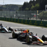 
              Red Bull driver Sergio Perez of Mexico, right, steers his car during the Formula One Grand Prix at the Spa-Francorchamps racetrack in Spa, Belgium, Sunday, Aug. 28, 2022. (AP Photo/Geert Vanden Wijngaert, Pool)
            