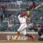 
              Atlanta Braves William Contreras hits a single in the first inning of a baseball game against the Colorado Rockies Wednesday, Aug. 31, 2022, in Atlanta. (AP Photo/Hakim Wright Sr.)
            