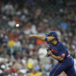 
              Houston Astros starting pitcher Luis Garcia throws against the Boston Red Sox during the first inning of a baseball game Monday, Aug. 1, 2022, in Houston. (AP Photo/David J. Phillip)
            