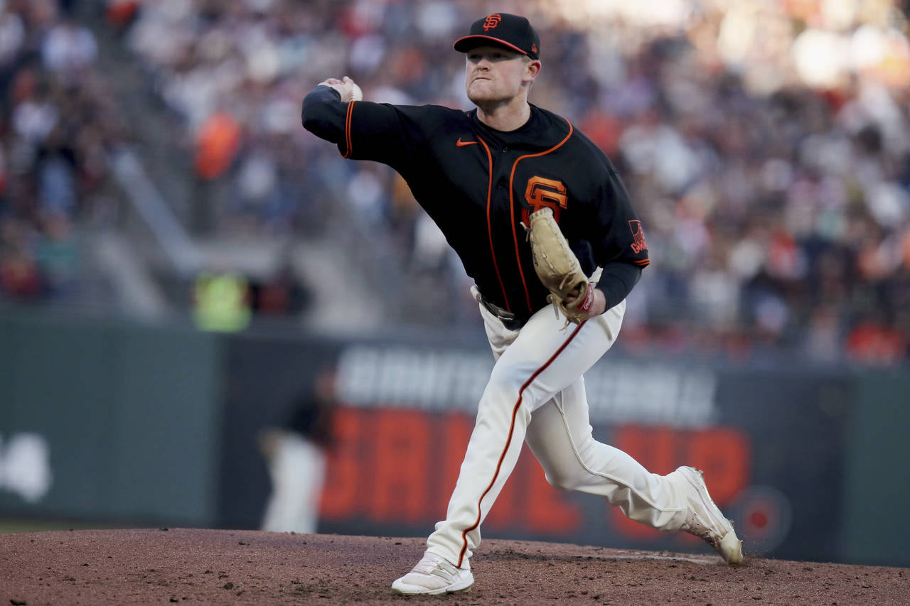 San Francisco Giants starting pitcher Logan Webb throws a pitch during the third inning of the team...