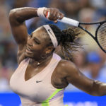 
              FILE - Serena Williams returns a shot to Emma Raducanu, of Britain, during the Western & Southern Open tennis tournament, Tuesday, Aug. 16, 2022, in Mason, Ohio. Serena Williams will compete in the U.S. Open tennis tournament that begins Monday. (AP Photo/Aaron Doster)
            