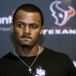 
              FILE - Houston Texans quarterback Deshaun Watson speaks to the media following an NFL football game against the New England Patriots, Sunday, Sept. 24, 2017, in Foxborough, Mass. The NFL suspended Watson for six games on Monday, Aug. 1, 2022 for violating its personal conduct policy following accusations of sexual misconduct made against him by two dozen women in Texas, two people familiar with the decision said. (AP Photo/Steven Senne, File)
            