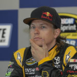 
              FILE - Kimi Raikkonen, of Finland, pauses during a news conference in Concord, N.C., May 20, 2011. Raikkonen will take a break from his retirement to return to racing this weekend in the NASCAR race at Watkins Glen. (AP Photo/Mike McCarn, File)
            