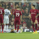 
              Liverpool's Darwin Nunez, second right, gestures after he was shown a red card during the English Premier League soccer match between Liverpool and Crystal Palace at Anfield stadium in Liverpool, England, Monday, Aug. 15, 2022. (AP Photo/Jon Super)
            
