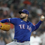
              Texas Rangers starting pitcher Martin Perez throws against the Texas Rangers during the first inning of a baseball game Tuesday, Aug. 9, 2022, in Houston. (AP Photo/David J. Phillip)
            