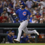 
              Chicago Cubs' Seiya Suzuki runs toward home to score on a double by Nico Hoerner during the fourth inning of the team's baseball game against the Washington Nationals, Tuesday, Aug. 16, 2022, in Washington. (AP Photo/Nick Wass)
            